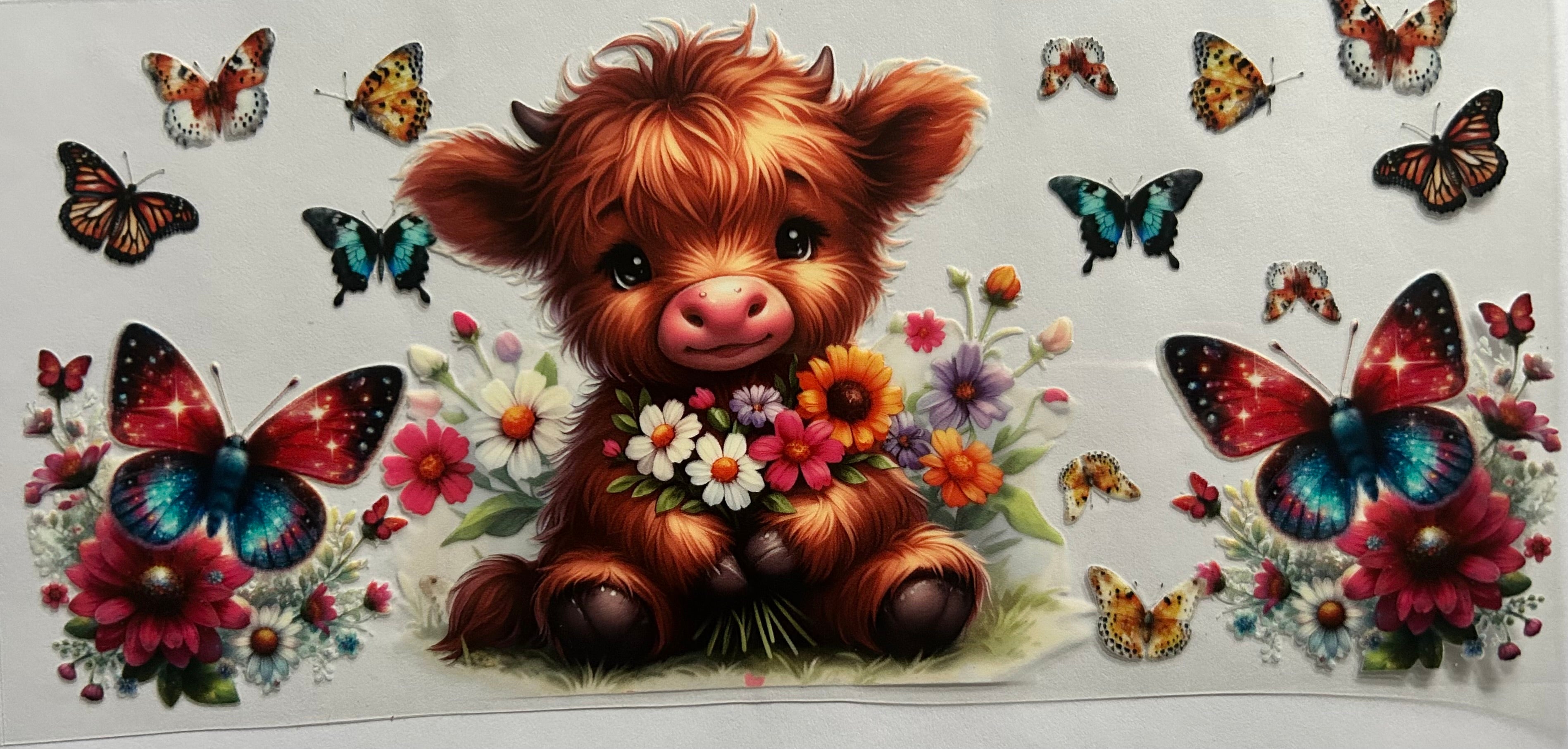 Highland cow, butterflies and flowers
