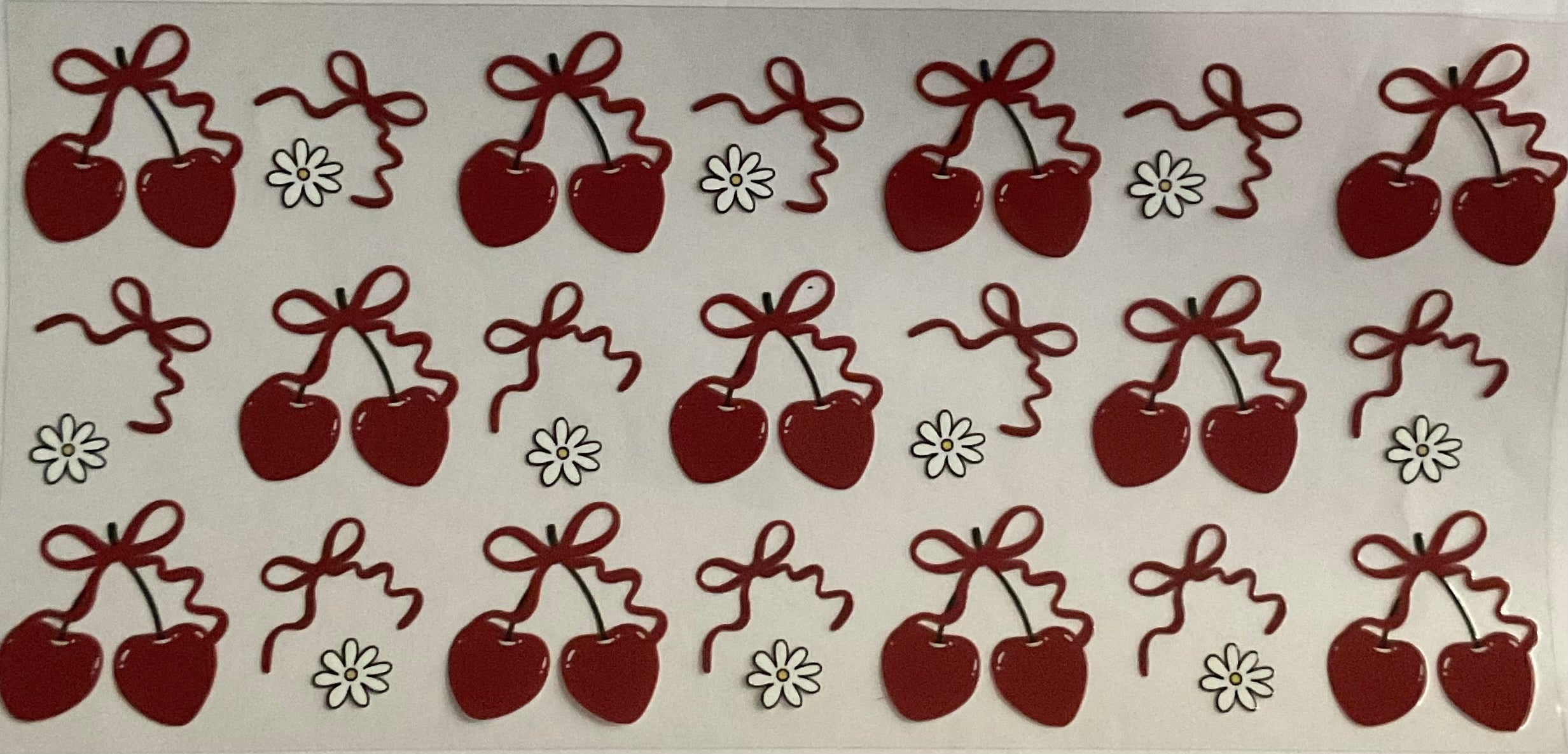 Cherries, bows and flowers